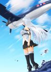  1girl aircraft azur_lane black_legwear black_neckwear black_skirt blue_sky enterprise_(azur_lane) from_below gold_trim highres lam_b long_hair looking_up miniskirt necktie pleated_skirt shirt skirt sky sleeveless sleeveless_shirt solo standing thigh-highs white_hair white_shirt zettai_ryouiki 