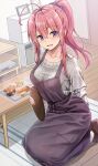  1girl ahoge apron collarbone commentary_request eyebrows_visible_through_hair food hair_between_eyes hair_ornament hair_scrunchie highres holding holding_plate indoors kotatsu_(kotatsu358) long_sleeves looking_at_viewer on_floor open_mouth original pink_hair plate purple_apron purple_scrunchie scrunchie shirt short_hair sitting solo violet_eyes wariza 