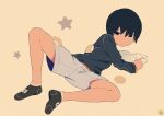  1boy black_hair book commentary hamster jitome leg_up lying male_focus noeyebrow_(mauve) on_side original short_hair shorts simple_background socks solo star_(symbol) symbol-only_commentary 