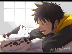  1boy artist_name black_hair black_jacket bloom chromatic_aberration commentary dog earrings facial_hair fur_hat goatee grey_eyes hat hood hood_down in_hat indoors jacket jewelry koma_heron letterboxed light_rays long_sleeves looking_at_another lower_teeth_only lying male_focus on_stomach one_piece open_mouth profile short_hair sideburns smile solo sunlight symbol-only_commentary teeth tongue tongue_out trafalgar_law twitter_username unworn_hat unworn_headwear v-shaped_eyebrows white_hat window 