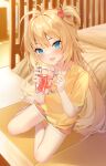  1girl :d akai_haato antenna_hair bangs barefoot bed blonde_hair blue_eyes blush commentary_request cup eyebrows_visible_through_hair fang full_body hair_ornament hands_up heart heart_hair_ornament highres holding holding_cup hololive indoors long_hair looking_at_viewer one_side_up orange_shorts shirt short_sleeves shorts sitting skin_fang smile solo uosaasou very_long_hair virtual_youtuber yellow_shirt 