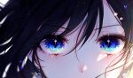  1girl black_hair blue_eyes close-up commentary constellation earrings english_commentary eye_focus floating_hair green_eyes hair_between_eyes highres jewelry looking_at_viewer mole mole_under_eye moon_so_00 original solo sparkle 