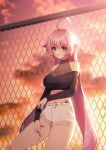  1girl ahoge backlighting bare_shoulders black_shirt blue_eyes breasts chain-link_fence cigarette crop_top cutoffs expressionless fence hair_flaps hand_on_own_thigh highres holding large_breasts long_hair long_sleeves looking_at_viewer midriff navel off-shoulder_shirt off_shoulder original pink_hair see-through shirt short_shorts shorts solo sunlight sunset thighs ugwa very_long_hair white_shorts 