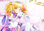  1girl animal animal_ear_fluff animal_ears bangs blonde_hair blush bow cat cat_ears cat_girl dress english_commentary frilled_dress frills hair_bow holding holding_animal holding_cat looking_at_viewer lumilive nota_ika off-shoulder_dress off_shoulder one_eye_closed purple_bow smile solo tail tail_bow tail_ornament thigh-highs tsukigami_yui twintails virtual_youtuber white_dress yellow_eyes 