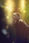  1boy bangs black_background black_hair black_jacket blurry blurry_background closed_mouth from_side grey_hair highres jacket kyuuba_melo looking_up male_focus multicolored_hair profile sasaki_haise solo tokyo_ghoul tokyo_ghoul:re two-tone_hair yellow_background 