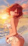  1girl ass beach bikini bow brown_hair floral_print grin halterneck highleg highleg_bikini highres higuchi_madoka idolmaster idolmaster_shiny_colors looking_at_viewer mole mole_under_eye ocean outdoors sand short_hair side-tie_bikini sky smile solo sunset swimsuit tiss_221 violet_eyes water white_bikini 