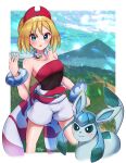  1girl blonde_hair blue_eyes eyebrow_cut glaceon highres irida_(pokemon) mountain pokemon pokemon_(game) pokemon_legends:_arceus shirt short_hair shorts strapless strapless_shirt wakaba_(wata_ridley) white_shorts 