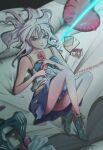  1girl bare_legs bed blue_footwear corded_phone full_body hair_between_eyes heart heart_pillow highres knees_up letter long_hair lying on_back original phone photo_(object) pillow rasukusekai shoes solo white_hair 