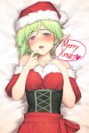  1girl bare_shoulders bed_sheet blush braid collarbone commentary crown_braid elf eyebrows_visible_through_hair fur-trimmed_headwear fur_trim green_hair h_kasei hands_on_own_chest hat heart highres looking_at_viewer lying merry_christmas on_back open_mouth original pointy_ears red_headwear santa_hat short_hair solo speech_bubble spoken_heart upper_body violet_eyes 