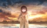  1girl absurdres brown_coat brown_eyes brown_hair can canned_coffee coat hair_ornament hairclip hand_up highres holding holding_can long_hair original outdoors scarf sei_ao solo standing sunset sweater_vest water 