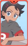  1boy bangs black_hair blue_background blue_eyes blurry closed_mouth commentary_request eyelashes goh_(pokemon) grey_shirt kouzuki_(reshika213) leaning looking_at_viewer male_focus notice_lines pokemon pokemon_(anime) pokemon_swsh_(anime) shirt short_hair short_sleeves solo 