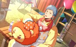  1boy animal_hands asch_albright balloon blush bow bowtie collar gloves grey_hair helios_rising_heroes highres long_sleeves looking_at_viewer lower_teeth_only male_focus official_art open_mouth orange_eyes paw_gloves pink_bow red_collar shirt sitting solo stuffed_animal stuffed_toy teddy_bear teeth yellow_shirt 