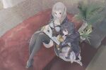  2girls black_hair book coat couch fire_emblem fire_emblem_awakening fire_emblem_heroes highres looking_at_viewer morgan_(fire_emblem) morgan_(fire_emblem)_(female) mother_and_daughter multiple_girls plant reading robin_(fire_emblem) robin_(fire_emblem)_(female) silver_hair sitting smile user_cwwh3722 