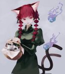  1girl animal_ear_fluff animal_ears bangs basket blunt_bangs braid cat_ears cat_tail cowboy_shot dress extra_ears green_dress grey_background highres hitodama holding holding_basket juliet_sleeves kaenbyou_rin light_smile long_hair long_sleeves looking_to_the_side multiple_tails nekomata parted_lips puffy_sleeves simple_background skull solo tail touhou twin_braids twintails two_tails yasuo 