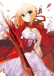  1girl ahoge blonde_hair blurry breasts cleavage corset fate/extra fate/grand_order fate_(series) flower green_eyes hair_flower hair_ornament highres holding holding_sword holding_weapon looking_at_viewer nero_claudius_(fate)_(all) ocean petals saber_extra short_hair smile solo sword vane weapon 