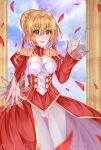 1girl ahoge blonde_hair blurry breasts cleavage corset fate/extra fate/grand_order fate_(series) flower green_eyes hair_flower hair_ornament highres looking_at_viewer nero_claudius_(fate)_(all) nicolicca ocean petals saber_extra short_hair smile solo 