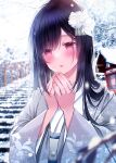  1girl absurdres bangs black_hair blurry blurry_background blush building floral_print flower hair_flower hair_ornament hands_up highres japanese_clothes kanzashi kimono kuro_namako long_hair long_sleeves obi original outdoors own_hands_together parted_lips pink_eyes sash shrine snow solo stairs tree white_flower white_kimono 