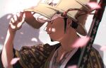  1boy black_hair cherry_blossoms dappled_sunlight facial_hair from_side hand_up hat highres japanese_clothes male_focus one_piece profile sheath sheathed solo sunlight trafalgar_law zumio 