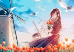  1girl backlighting bangs bird black_dress black_hair blue_eyes clouds cloudy_sky commentary_request dress eyebrows_visible_through_hair flower frilled_dress frills from_side grin hiten_(hitenkei) holding holding_flower lace-trimmed_dress lace_trim long_hair looking_at_viewer orange_flower original outdoors red_flower red_tulip sidelocks sky smile solo standing sunset swept_bangs tulip windmill 