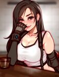  1girl artist_name black_hair blush blushy-pixy breasts crop_top cup dangle_earrings drinking_glass earrings elbow_pads final_fantasy final_fantasy_vii final_fantasy_vii_remake fingerless_gloves gloves jewelry large_breasts long_hair looking_at_viewer red_eyes shot_glass signature sitting smile solo suspenders tank_top tifa_lockhart undershirt white_tank_top 