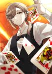  1boy ahoge bangs black_bow black_bowtie black_vest blurry blurry_background blurry_foreground bokeh bow bowtie brown_hair card commentary_request depth_of_field earrings formal from_below green_eyes highres indoors jewelry kanae_(nijisanji) looking_at_viewer looking_down male_focus mole mole_under_eye nana72710193 nijisanji playing_card ponytail shirt short_ponytail solo swept_bangs upper_body vest virtual_youtuber white_shirt 
