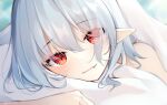  1girl bangs bare_shoulders blanket blush commentary_request eyelashes eyes_visible_through_hair fang fang_out light_blue_hair looking_at_viewer lying miy@ on_stomach parted_lips pillow pointy_ears red_eyes remilia_scarlet shiny shiny_hair short_hair sidelocks slit_pupils solo touhou under_covers wavy_hair 