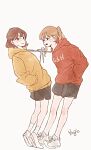 2girls black_shorts blush brown_eyes brown_hair closed_mouth clothes_writing commentary drawstring full_body hands_in_pockets highres hood hood_down hoodie hsu-jo light_brown_hair long_hair looking_at_another looking_at_viewer multiple_girls original ponytail red_hoodie short_hair shorts simple_background smile socks sweat white_background white_footwear white_legwear yellow_hoodie 