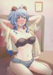  1girl absurdres ahoge armpits arms_up bandeau bangs bare_legs barefoot beige_shirt blue_hair blush bra breasts collarbone commentary_request er_gou_daoren eyebrows_visible_through_hair ganyu_(genshin_impact) genshin_impact grey_shorts hair_between_eyes hair_tie_in_mouth highres horns indoors long_hair looking_at_viewer medium_breasts micro_shorts mouth_hold navel nose_blush open_clothes open_shirt short_sleeves shorts sitting solo stomach strapless strapless_bra thighs underwear very_long_hair violet_eyes wariza 
