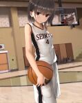  1girl ball bangs basketball basketball_court basketball_uniform blunt_bangs brown_eyes brown_hair egami eyebrows_visible_through_hair highres holding holding_ball indoors long_hair looking_at_viewer original short_hair shorts sleeveless solo sportswear white_shorts 