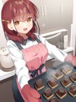  1girl :d apron bangs brown_eyes commentary_request eyebrows_visible_through_hair food hair_behind_ear hair_over_shoulder highres holding indoors long_sleeves looking_at_viewer microwave muninshiki original pink_apron red_mittens redhead shirt smile solo standing steam white_shirt younger_twin_sister_(muninshiki) 