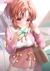  1girl abe_nana absurdres bag blush breasts cardigan gift highres holding holding_gift idolmaster idolmaster_cinderella_girls indoors large_breasts looking_at_viewer ningen_mame orange_hair pink_cardigan ponytail red_eyes shopping_bag smile solo 