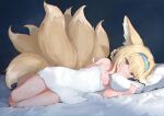  1girl absurdres akadashi1210 alternate_costume animal_ear_fluff arknights bare_legs bare_shoulders barefoot bed_sheet blue_hairband blush dress eyebrows_visible_through_hair green_eyes hair_rings hairband highres large_tail lying multiple_tails on_bed on_side pillow sleeveless sleeveless_dress solo spaghetti_strap strap_slip sundress suzuran_(arknights) tail 