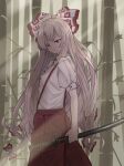 1girl :/ absurdres arm_at_side bamboo bamboo_forest bow breasts buttons closed_mouth commentary cowboy_shot forest from_side fujiwara_no_mokou hair_bow highres holding holding_sword holding_weapon jitome kaden_(muxt8423) leaf long_hair looking_at_viewer looking_to_the_side nature outdoors pants puffy_short_sleeves puffy_sleeves red_eyes red_pants shade shirt short_sleeves sleeve_cuffs small_breasts solo suspenders sword touhou tsurime v-shaped_eyebrows very_long_hair wakizashi weapon white_bow white_hair white_shirt 