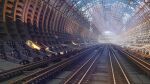  blue_sky clouds commentary day highres indoors light_rays no_humans original railroad_tracks scenery sky sunlight train_station waisshu_(sougyokyuu) window 