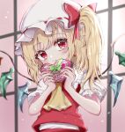  1girl absurdres ascot bangs blonde_hair blurry blush box closed_mouth crystal depth_of_field eyebrows_visible_through_hair flandre_scarlet gift hands_up hat heart-shaped_box highres holding holding_box holding_gift indoors kayon_(touzoku) long_hair mob_cap one_side_up pink_background puffy_short_sleeves puffy_sleeves red_eyes red_skirt red_vest short_sleeves simple_background skirt slit_pupils solo touhou upper_body vest white_headwear window wings yellow_ascot 