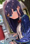  1girl bangs blue_eyes blue_jacket blurry blurry_background blush bow bowtie closed_mouth dappled_sunlight eyebrows_visible_through_hair eyes_visible_through_hair gate hair_ornament hairclip highres holding jacket long_hair looking_at_viewer manga_(object) motto_notto original outdoors purple_hair red_bow red_bowtie school_uniform solo sunlight thai_commentary thai_text tree 