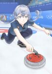  1girl 2022_winter_olympics alternate_costume bangs black_footwear blue_eyes blue_hair blue_pants blue_shirt closed_mouth commentary_request curling curling_broom curling_stone eyebrows_visible_through_hair gotland_(kancolle) hair_between_eyes hair_bun highres holding kantai_collection mole mole_under_eye olympics one_knee pants shirt short_sleeves sliding solo sport taruya uniqlo 