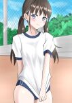  1girl blue_buruma blue_eyes blush brown_hair buruma chain-link_fence clothes_pull copal_(hpja3327) embarrassed fence gym_uniform highres long_hair looking_at_viewer low_twintails original outdoors pulled_by_self shirt shirt_pull shirt_tug short_sleeves solo thighs twintails white_shirt 