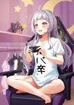  1girl ahoge bangs bare_legs barefoot blush chair clothes_hanger commentary_request controller full_body game_controller gaming_chair highres holding holding_controller holding_game_controller hololive indian_style indoors long_hair looking_away murasaki_shion open_mouth shinka_(yonkun121) shiokko_(murasaki_shion) shirt silver_hair sitting smile solo t-shirt white_shirt yellow_eyes 