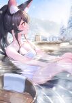  1girl absurdres animal_ear_fluff animal_ears bangs between_legs black_hair blush breasts brown_eyes bucket closed_mouth commentary_request from_side hand_between_legs highres hololive long_hair medium_breasts multicolored_hair naked_towel nemoto_yuuma onsen ookami_mio outdoors ponytail profile redhead sitting snow snowing solo streaked_hair towel virtual_youtuber wolf_ears 