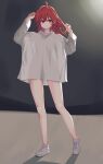  1girl absurdres ahoge arms_up bare_legs blush highres idolmaster idolmaster_shiny_colors jokarara komiya_kaho looking_at_viewer no_pants oversized_clothes oversized_shirt red_eyes redhead see-through_silhouette shirt shoes simple_background smile sneakers solo white_shirt 