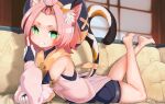 1girl animal_ear_fluff animal_ears bangs_pinned_back bare_shoulders barefoot cat_ears cat_girl cat_tail couch diona_(genshin_impact) eyes_visible_through_hair genshin_impact green_eyes grin hand_up highres indoors legs_up looking_at_viewer lying middle_finger on_couch on_stomach pink_hair pink_shirt pureakuma ribbon shiny shirt short_hair short_shorts shorts smile soles solo tail tail_ornament tail_raised tail_ribbon teeth 