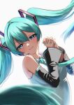  1girl absurdres aqua_eyes aqua_hair aqua_nails closed_mouth detached_sleeves fingernails grey_background hatsune_miku headset highres long_hair looking_at_viewer shooot108 simple_background smile solo twintails vocaloid 