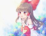  1girl ascot bangs bare_shoulders blue_background blush bow brown_hair detached_sleeves eyebrows_visible_through_hair flower hair_bow hair_tubes hakurei_reimu highres hydrangea long_hair looking_at_viewer open_mouth red_bow red_eyes ribbon_trim sidelocks solo ssmlqzdss touhou upper_body 