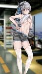  1girl blurry blurry_background blush bronya_zaychik curly_hair dripping gym honkai_(series) honkai_impact_3rd looking_at_viewer navel see-through short_shorts solo solo_focus stockings stomach sweat wet_clothes 