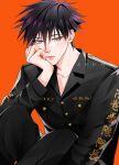  1boy artist_name black_hair black_pants black_shirt buttons closed_mouth clothes_writing eyelashes fushiguro_megumi green_eyes hand_on_own_cheek hand_on_own_face head_rest highres jujutsu_kaisen long_sleeves male_focus orange_background pants shirt short_hair simple_background solo spiky_hair z0umu 