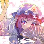  1girl :d ass bangs barefoot blue_headwear blue_kimono blush covering_mouth eyebrows_visible_through_hair feet_up floral_print frills hand_fan hat highres holding holding_fan japanese_clothes kimono looking_at_viewer lying mob_cap on_stomach open_mouth petals pink_eyes pink_hair saigyouji_yuyuko shiroi_karasu short_hair simple_background smile solo touhou triangular_headpiece white_background 