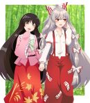 2girls :d bamboo bamboo_forest black_hair border bow closed_eyes collared_shirt eyebrows_visible_through_hair forest frilled_sleeves frills fujiwara_no_mokou green_bow grey_hair hair_bow hand_in_own_hair highres holding_hands houraisan_kaguya long_hair long_skirt long_sleeves looking_to_the_side multiple_bows multiple_girls nature ofuda ofuda_on_clothes oni_tama open_mouth outdoors pants pink_shirt red_eyes red_pants red_skirt shirt skirt smile standing suspenders touhou white_border white_bow white_shirt wide_sleeves