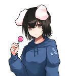  1girl absurdres alternate_costume animal_ears bangs black_hair black_outline blue_hoodie blush brown_eyes candy commentary_request eyebrows_visible_through_hair floppy_ears food hair_between_eyes highres holding holding_candy holding_food holding_lollipop hood hoodie inaba_tewi lollipop looking_at_viewer outline parted_lips rabbit_ears short_hair simple_background solo touhou upper_body white_background yagoro_kusuriya 
