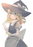  1girl :t apron artist_request blonde_hair blush bow braid dango eating food fruit hat highres holding holding_food kirisame_marisa looking_at_viewer puffy_sleeves short_sleeves single_braid solo touhou vest wagashi waist_apron witch_hat 